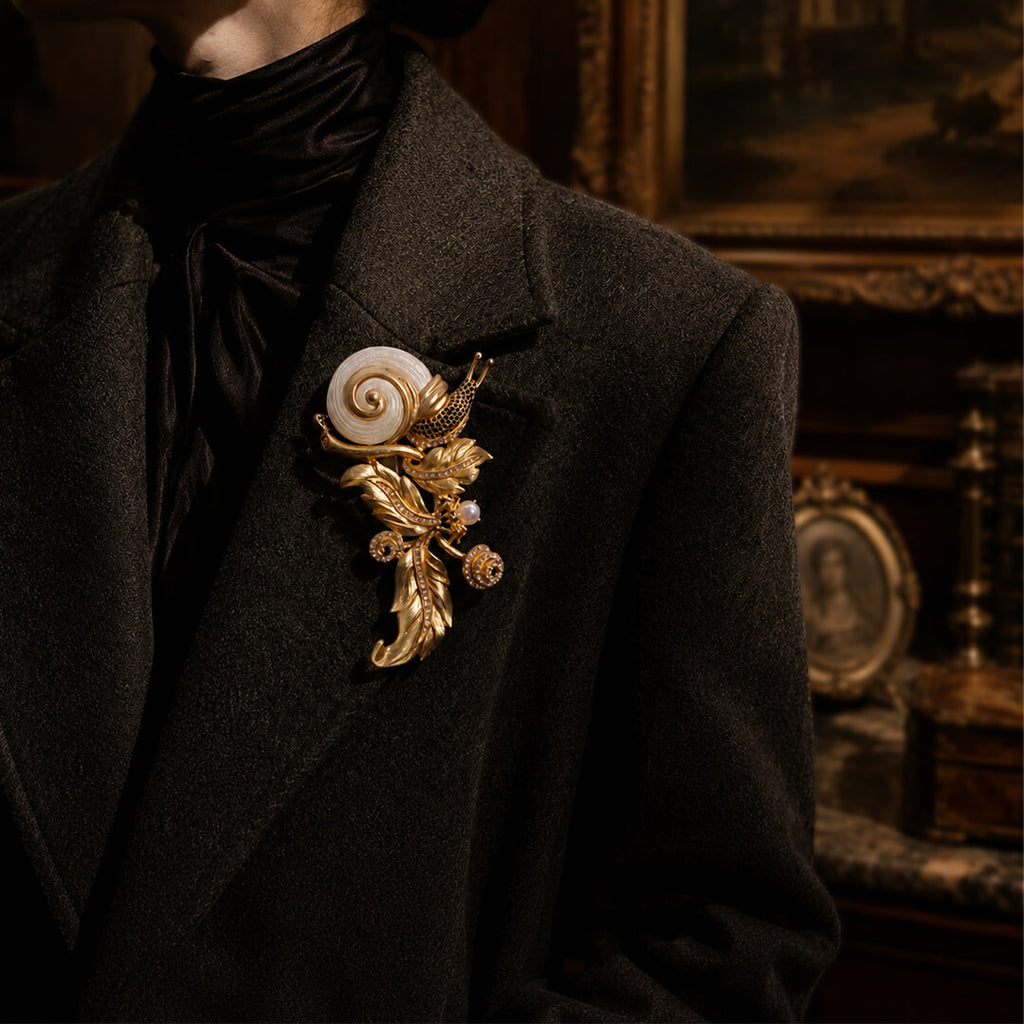 Styling a massive 1980s runway-inspired gold snail statement brooch with a tailored blazer.