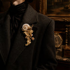 Styling a massive 1980s runway-inspired gold snail statement brooch with a tailored blazer.