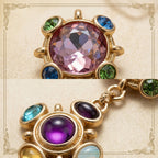 Close up of high-quality colorful resin gems on vintage style gold plated statement earrings.