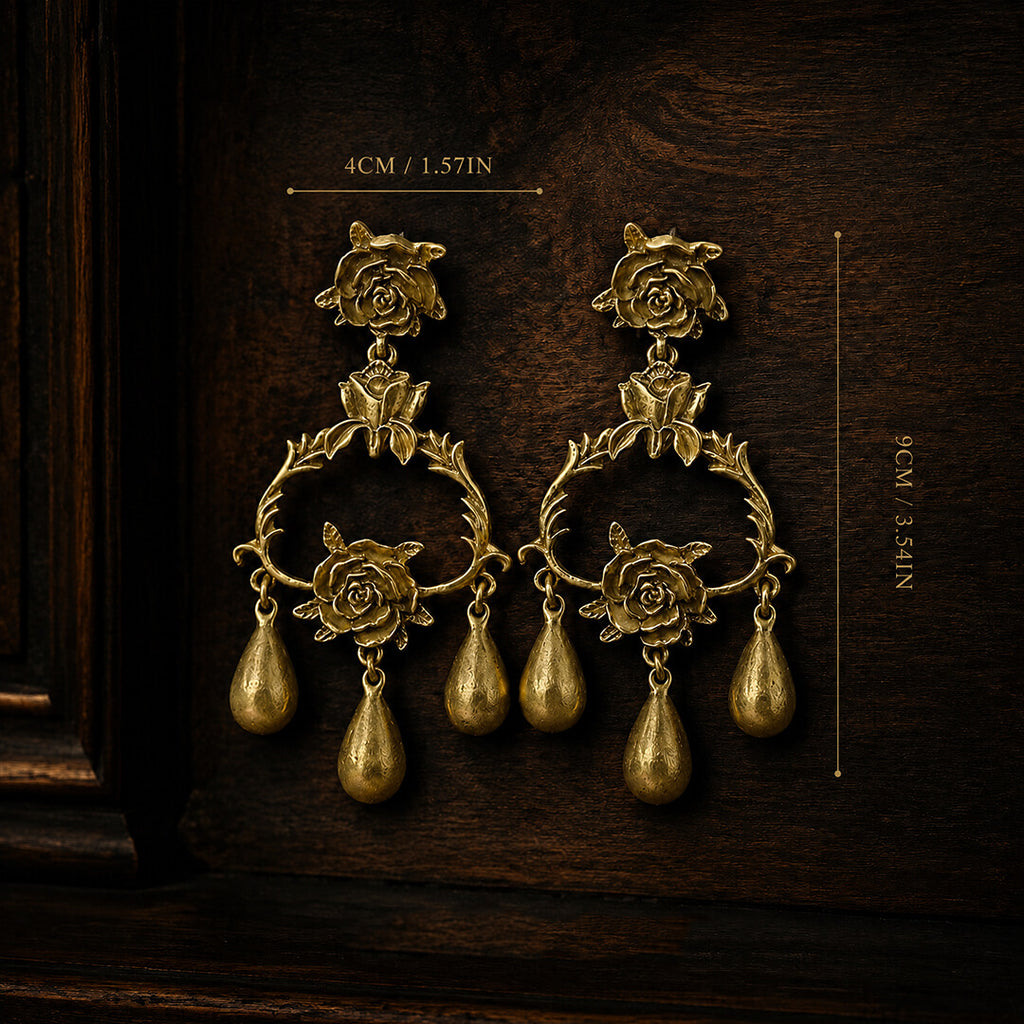 Dimensions and size chart for the vintage-inspired gold rose statement earrings, length 9 centimeters.