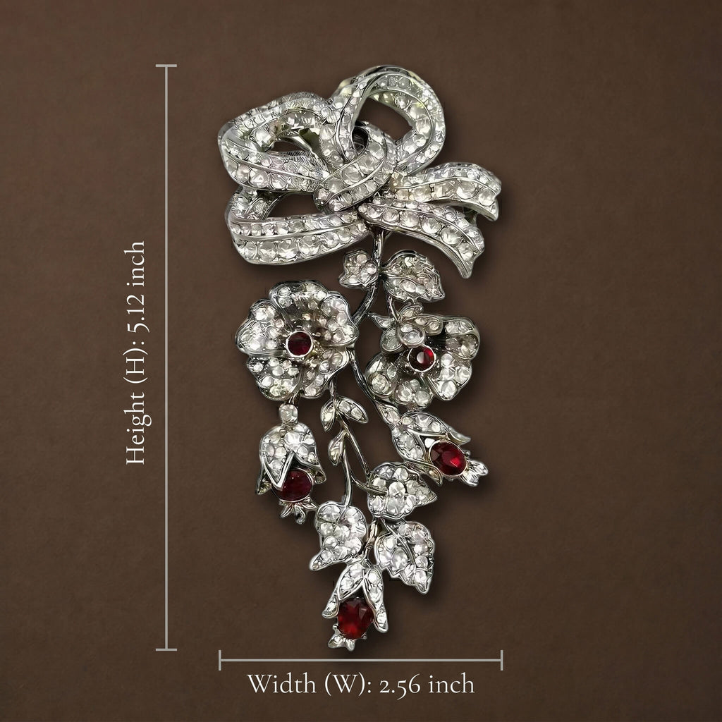 Size guide and dimensions for the Empress Bow statement brooch showing a height of 5.12 inches and width of 2.56 inches.