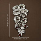 Size guide and dimensions for the Empress Bow statement brooch showing a height of 5.12 inches and width of 2.56 inches.