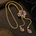 Vintage-Inspired lavender floral lariat necklace with an antique gold-tone chain and double pendant drops.
