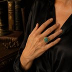 Vintage-Inspired turquoise cluster statement ring worn with a black evening outfit.