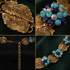 Close-up details of a Vintage-Inspired turquoise statement necklace with textured gold-tone leaves and clustered beads.